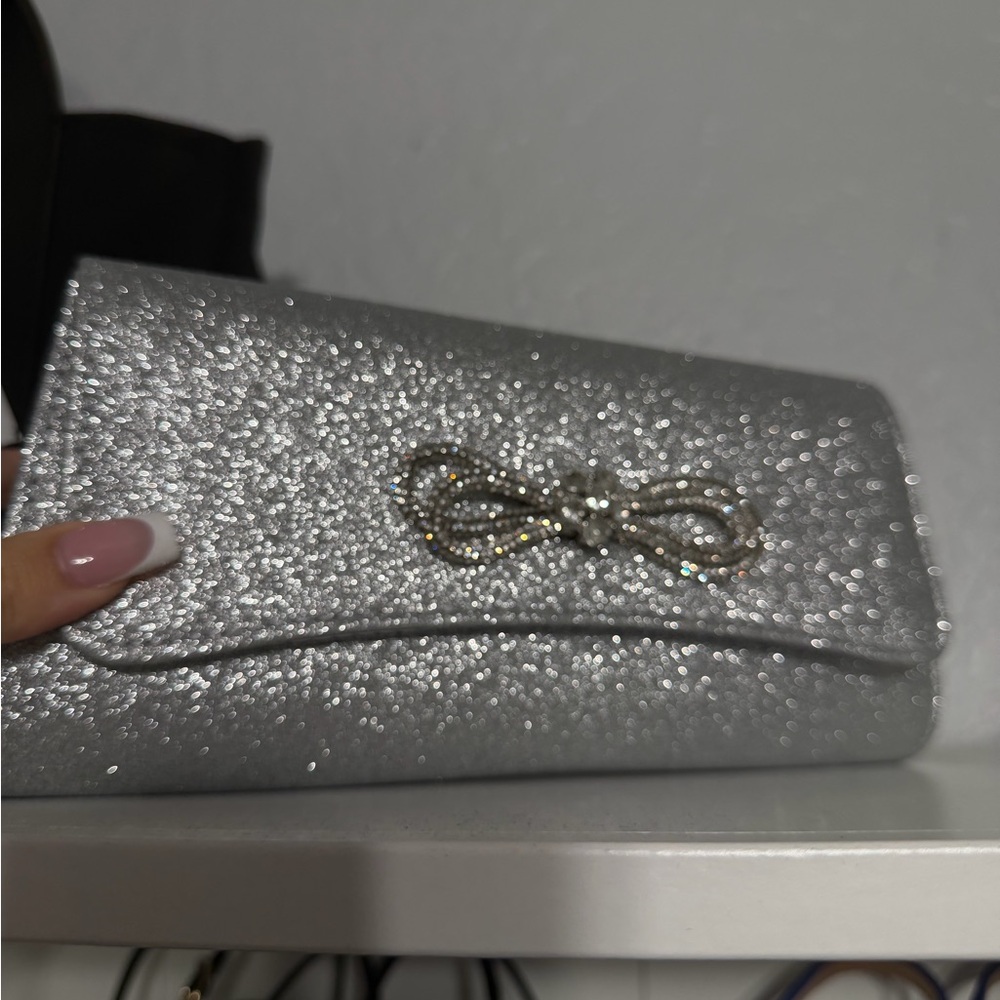 Elegant Silver Clutch with Bow Accent